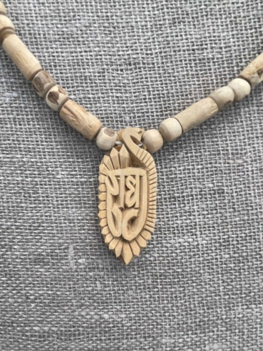 Tulsi Kanthi Mala with a "Radha" Pendant